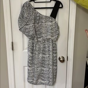 Asymmetrical black and white dress